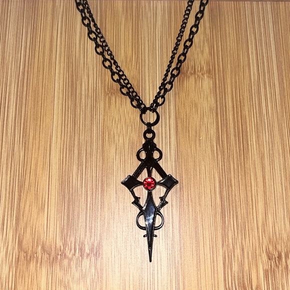 Hand Crafted Black Cross Pendant Necklace with Red Accent - Picture 2 of 4